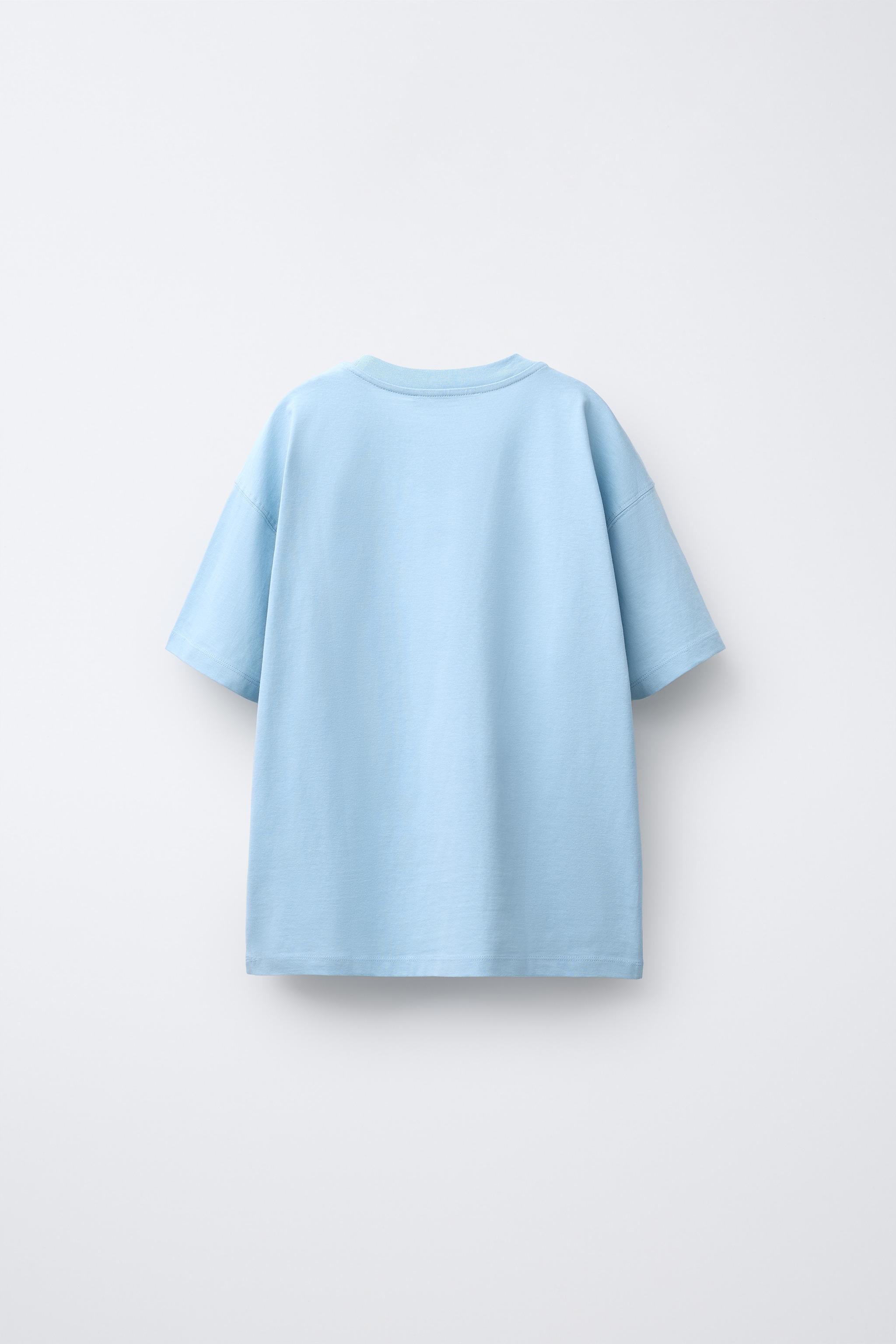 LOT DE TROIS T-SHIRTS À RAYURES ET UNIS